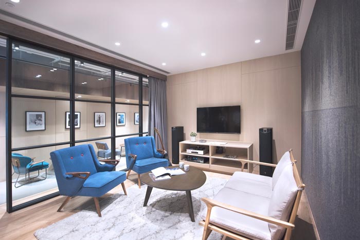 音樂傳媒公司辦公室交流區(qū)域裝修設(shè)計案例效果圖